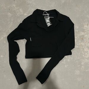 Black long sleeve collared top